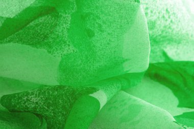 Doku. Geçmişi. şablon. Soyut yeşil ipek şifon kumaş. Bahar yeşili tafta ipek kumaşın sanat modeli.