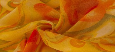 Doku, Desen. Soyut kırmızı baskı ile pürüzsüz sarı kumaş dokusu. Lüks soyut bir arka plan. Lüks Noel geçmişi. Kumaş, narin.