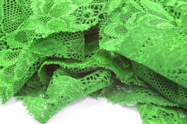 Yeşil dantel. Elastik moda tekstil jakuzi danteli. Seksi iç çamaşırları için dekoratif bir şey. Lastik bantlar. Ev dekoru. Tasarımın için doku. Geçmişi. şablon.