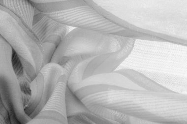 Doku. Geçmişi. Tek renkli gri ipek kumaş, bir fotoğraf ya da resim siyah beyaz ya da tek renk farklı tonlarda geliştirilmiş ya da uygulanmış..