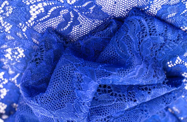 Blue lace. Elastic fashionable textile jacquard lace. Decorative item for sexy lingerie. elastic tapes. Home decor. Texture for your design. background. template.