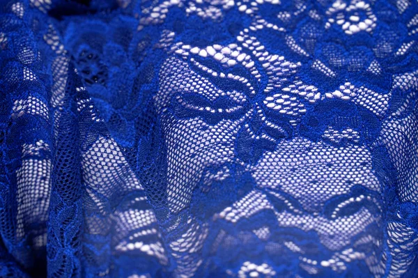 Blue lace. Elastic fashionable textile jacquard lace. Decorative item for sexy lingerie. elastic tapes. Home decor. Texture for your design. background. template.