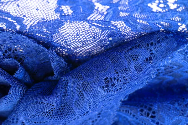 Blue lace. Elastic fashionable textile jacquard lace. Decorative item for sexy lingerie. elastic tapes. Home decor. Texture for your design. background. template.