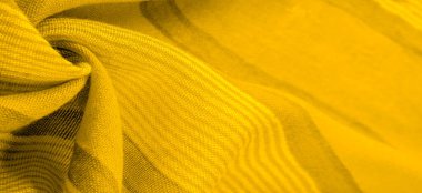 Doku. Geçmişi. Sarı renkli ipek kumaş, spektrumdaki yeşil ve turuncu arasındaki renk, maviye tamamlayıcı nitelikte birincil bir renk; olgun limon ya da yumurta sarısı gibi renklendirilmiş.