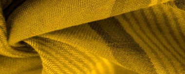 Doku. Geçmişi. Sarı renkli ipek kumaş, spektrumdaki yeşil ve turuncu arasındaki renk, maviye tamamlayıcı nitelikte birincil bir renk; olgun limon ya da yumurta sarısı gibi renklendirilmiş.