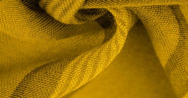 Doku. Geçmişi. Sarı renkli ipek kumaş, spektrumdaki yeşil ve turuncu arasındaki renk, maviye tamamlayıcı nitelikte birincil bir renk; olgun limon ya da yumurta sarısı gibi renklendirilmiş.