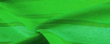 Doku. Geçmişi. İpek kumaş yeşil taze renk, spektrumda mavi ve sarı arasında renk; çimen ya da zümrüt gibi renkli.