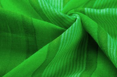 Doku. Geçmişi. İpek kumaş yeşil taze renk, spektrumda mavi ve sarı arasında renk; çimen ya da zümrüt gibi renkli.