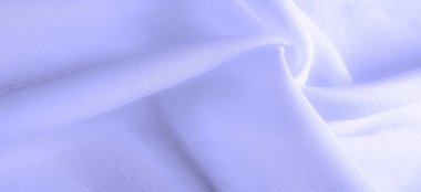 Doku. Geçmişi. açık mavi ipek kumaş. İpek böcekleri tarafından üretilen ince, güçlü, yumuşak, parlak lifler. bir yüzeyin ya da maddenin hissi, görünüşü ya da tutarlılığı.