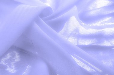 Doku. Geçmişi. açık mavi ipek kumaş. İpek böcekleri tarafından üretilen ince, güçlü, yumuşak, parlak lifler. bir yüzeyin ya da maddenin hissi, görünüşü ya da tutarlılığı.