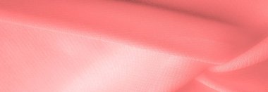 Doku. Geçmişi. kırmızı pembe ipek kumaş. İnce, güçlü, yumuşak, parlak bir lif ipek böcekleri tarafından kozalar oluşturuluyor ve iplik ve kumaş yapmak için toplanıyor..