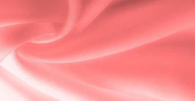 Doku. Geçmişi. kırmızı pembe ipek kumaş. İnce, güçlü, yumuşak, parlak bir lif ipek böcekleri tarafından kozalar oluşturuluyor ve iplik ve kumaş yapmak için toplanıyor..
