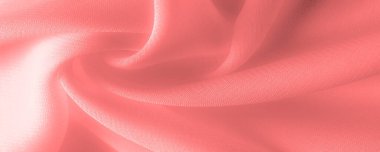 Doku. Geçmişi. kırmızı pembe ipek kumaş. İnce, güçlü, yumuşak, parlak bir lif ipek böcekleri tarafından kozalar oluşturuluyor ve iplik ve kumaş yapmak için toplanıyor..
