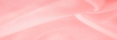 Doku. Geçmişi. kırmızı pembe ipek kumaş. İnce, güçlü, yumuşak, parlak bir lif ipek böcekleri tarafından kozalar oluşturuluyor ve iplik ve kumaş yapmak için toplanıyor..