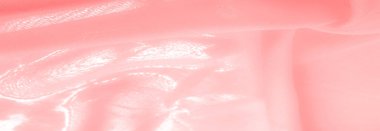 Doku. Geçmişi. kırmızı pembe ipek kumaş. İnce, güçlü, yumuşak, parlak bir lif ipek böcekleri tarafından kozalar oluşturuluyor ve iplik ve kumaş yapmak için toplanıyor..