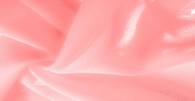 Doku. Geçmişi. kırmızı pembe ipek kumaş. İnce, güçlü, yumuşak, parlak bir lif ipek böcekleri tarafından kozalar oluşturuluyor ve iplik ve kumaş yapmak için toplanıyor..