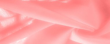 Doku. Geçmişi. kırmızı pembe ipek kumaş. İnce, güçlü, yumuşak, parlak bir lif ipek böcekleri tarafından kozalar oluşturuluyor ve iplik ve kumaş yapmak için toplanıyor..