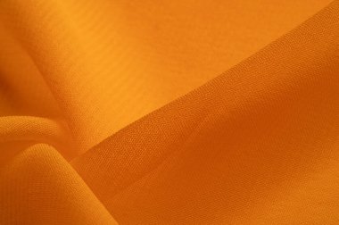 Doku. Geçmişi. Şablon. Bir yüzeyin ya da maddenin hissi, görünüşü ya da tutarlılığı. Sarı ipek kumaş