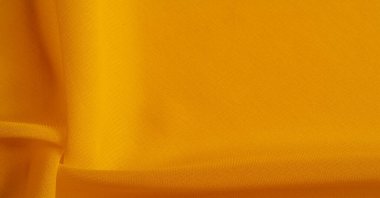 Doku. Geçmişi. Şablon. Bir yüzeyin ya da maddenin hissi, görünüşü ya da tutarlılığı. Sarı ipek kumaş