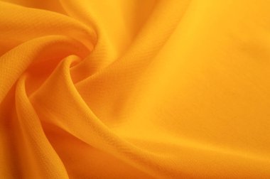 Doku. Geçmişi. Şablon. Bir yüzeyin ya da maddenin hissi, görünüşü ya da tutarlılığı. Sarı ipek kumaş