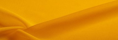 Doku. Geçmişi. Şablon. Bir yüzeyin ya da maddenin hissi, görünüşü ya da tutarlılığı. Sarı ipek kumaş