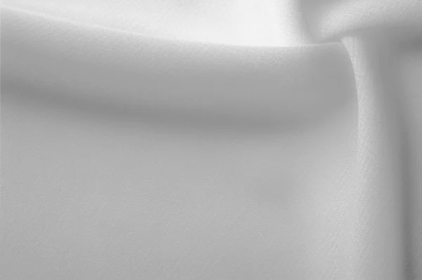 Texture. Background. the area or scenery behind the main object of contemplation, especially when perceived as a framework for it. White silk fabric