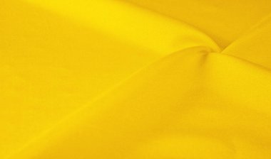 Sarı ipek kumaş, zarif, zarif, sarı saten, lüks kumaş, soyut tasarım. arkaplan dokusu, desen