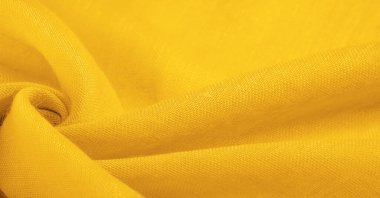 Sarı ince taneli doku. Sarı ipek keçeli kadife kumaş. Doku arka planı. Arkaplan kumaşı