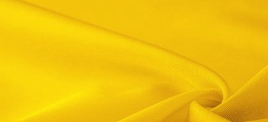 Sarı ipek kumaş, zarif, zarif, sarı saten, lüks kumaş, soyut tasarım. arkaplan dokusu, desen