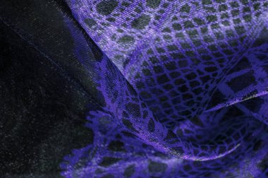 Doku, arka plan, desen. Safir mavi dantel kumaş, mavi ve siyah kumaşın karışımı. Lacivert, safir, gök mavisi, homo.