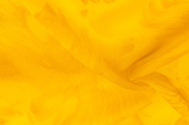 Arkaplan dokusu, sarı ipek kumaş boyalı çayır çiçekleri, spektrumda yeşil ve turuncu arasında renkler, ana çıkarıcı renk, olgun limon ya da yumurta sarısı gibi boyanmış..