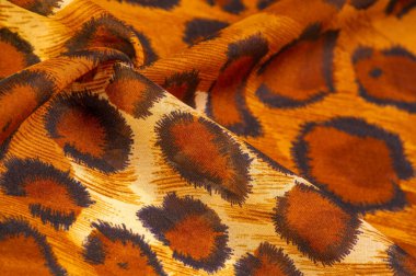 Açık ipek kumaş, çita derisi, kahverengi. Afrika savanası teması. Arkaplan dokusu, desen