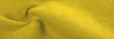 Sarı yün kumaş. Amber sarısı keçeli kumaş, soyut sanat. Arkaplan dokusu, desen