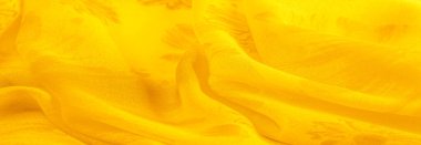 Arkaplan dokusu, sarı ipek kumaş boyalı çayır çiçekleri, spektrumda yeşil ve turuncu arasında renkler, ana çıkarıcı renk, olgun limon ya da yumurta sarısı gibi boyanmış..