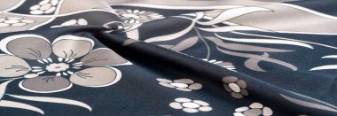 Beyaz çiçek desenli siyah ipek kumaş, geometrik çizgiler. Her tasarıma entelektüellik katmak için mükemmel. Doku, arkaplan, desen