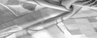 Doku. Geçmişi. Şablon. Soyut desenli siyah gri beyaz kumaş, bitki dallarının izi. Boz, boz, gri, kurşunlu, soluk