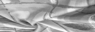 Doku. Geçmişi. Şablon. Soyut desenli siyah gri beyaz kumaş, bitki dallarının izi. Boz, boz, gri, kurşunlu, soluk