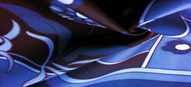 Kahverengi-mavi kumaş, beyaz çiçek desenli, geometrik çizgiler. Doku, arkaplan, desen