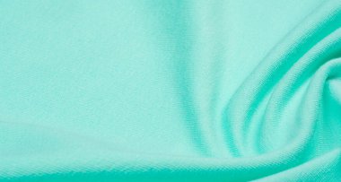 Örgü kumaş mavisi, turkuaz, mavi. Doku, arkaplan, desen.