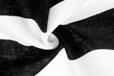 Pamuk kumaş, beyaz ve siyah çizgili. Katı lakonik tasarım. Modern geometrik arka planlar. Arkaplan dokusu