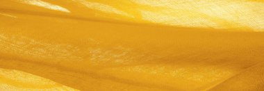 Sarı ince taneli doku. Sarı ipek keçeli kadife kumaş. Doku arka planı. Arkaplan kumaşı