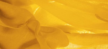 Sarı ince taneli doku. Sarı ipek keçeli kadife kumaş. Doku arka planı. Arkaplan kumaşı