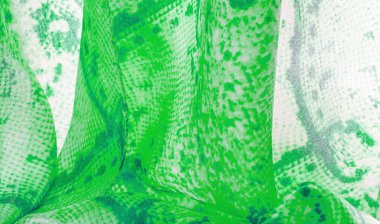 Yılan derisi desenli yeşil kumaş, parlak yeşil kumaşın arka plan dokusu yakın. arkaplan, doku, desen