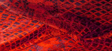 Doku, arka plan, desen. Yakut kırmızısı dantel kumaş, kırmızı ve siyah kumaşın karışımı. Kızarır, kızarır, kızarır, kızarır.