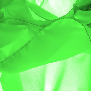 Yeşil ipek kumaş, zarif, dalgalı, yeşil saten ipek lüks kumaş, soyut tasarım. arkaplan dokusu, desen