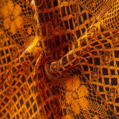 Kahverengi dantel kumaş, kehribar ve siyah kumaş karışımı. Kehribar, doku, arkaplan, desen.