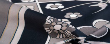 Doku, arkaplan, desen, beyaz çiçek desenli siyah ipek, geometrik çizgiler. Yeni, modern renk paletini tanıtır, herhangi bir tasarıma karmaşıklık eklemeyi ideal kılar.