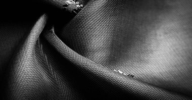 İpek kumaş, koyu siyah küçük desen, çizgilerin, renklerin ve gölgelerin birleşimi. doku arkaplanı, desen