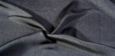 Siyah kumaş. Doğal kumaştan soyut kırmızı arkaplan. Pamuk. Doku, arkaplan, desen