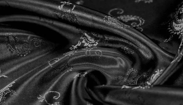 Black silk chiffon with paisley print. This is a beautiful floral design for your creativity. Texture, background, pattern